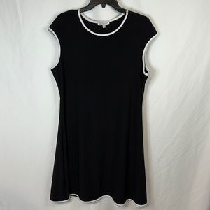 Black flared dress with white accents